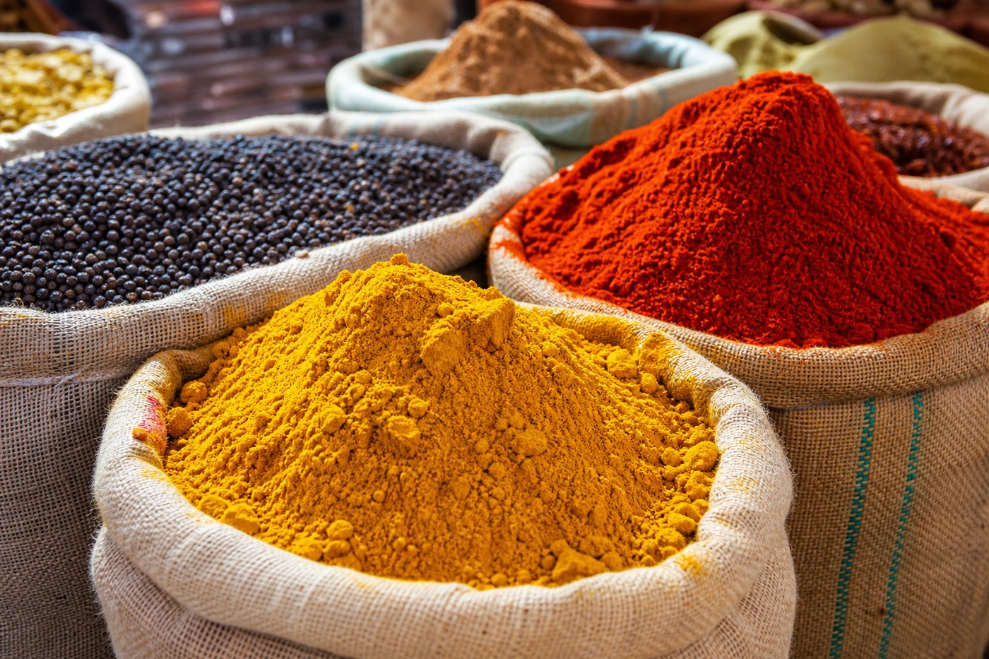 Turmeric, paprika, and peppercorn sacks
